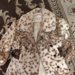 Chic Faux Fur Coat with Brown Accents